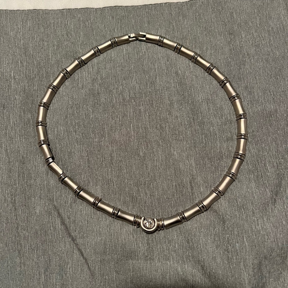 Silver Circular Necklace with Textured Links and Centerpiece